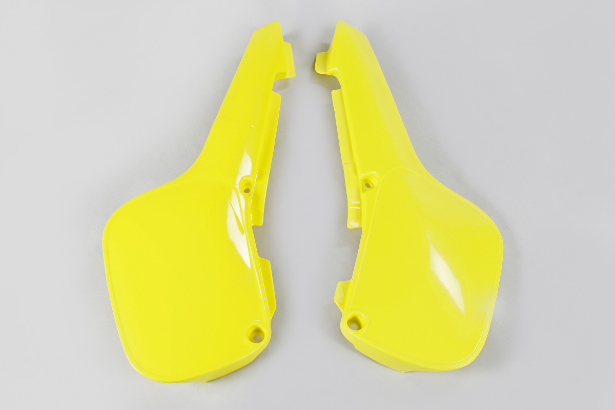 Fiancatine Laterali giallo per Suzuki RM 60 (2003-04) - PLASTICHE REPLICA - SU03923-102 - Ufo Plast